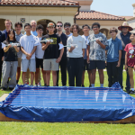 Students proudly display their bionic fish before the big race